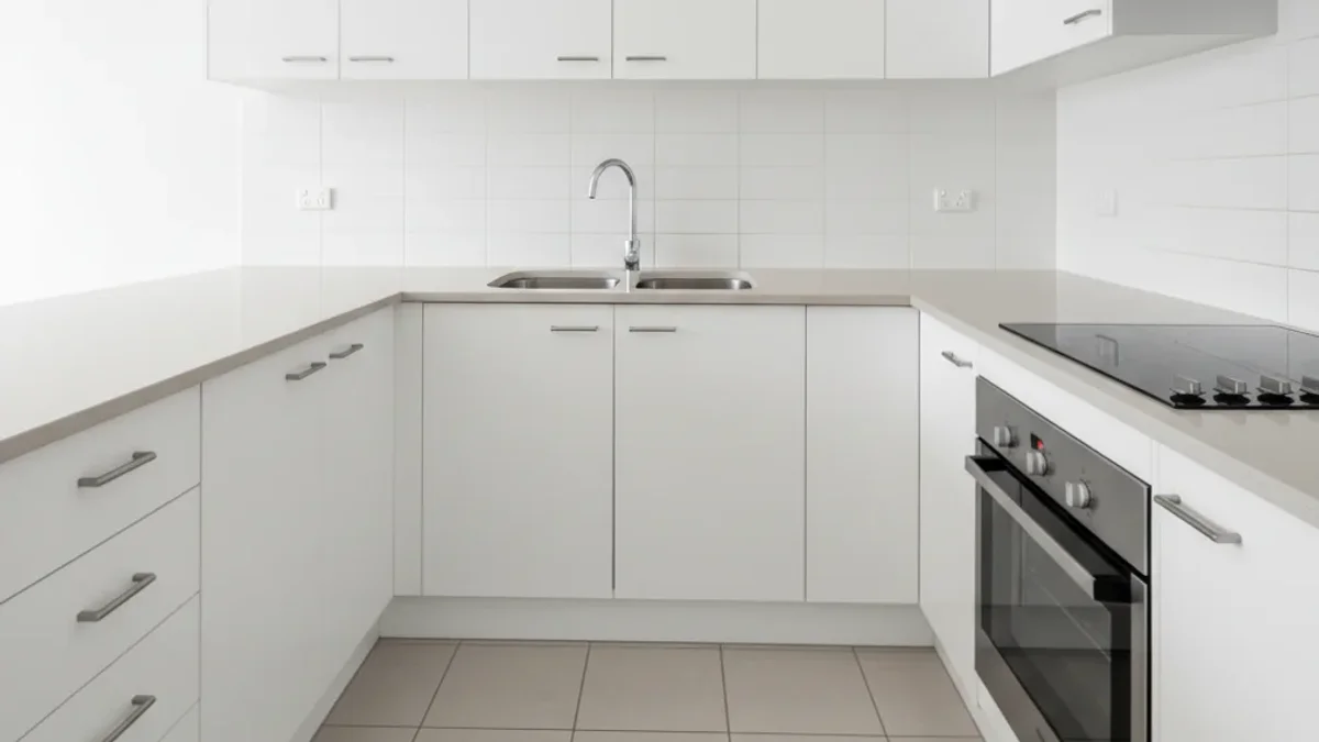 Professional bond cleaning kitchen with spotless oven and countertops